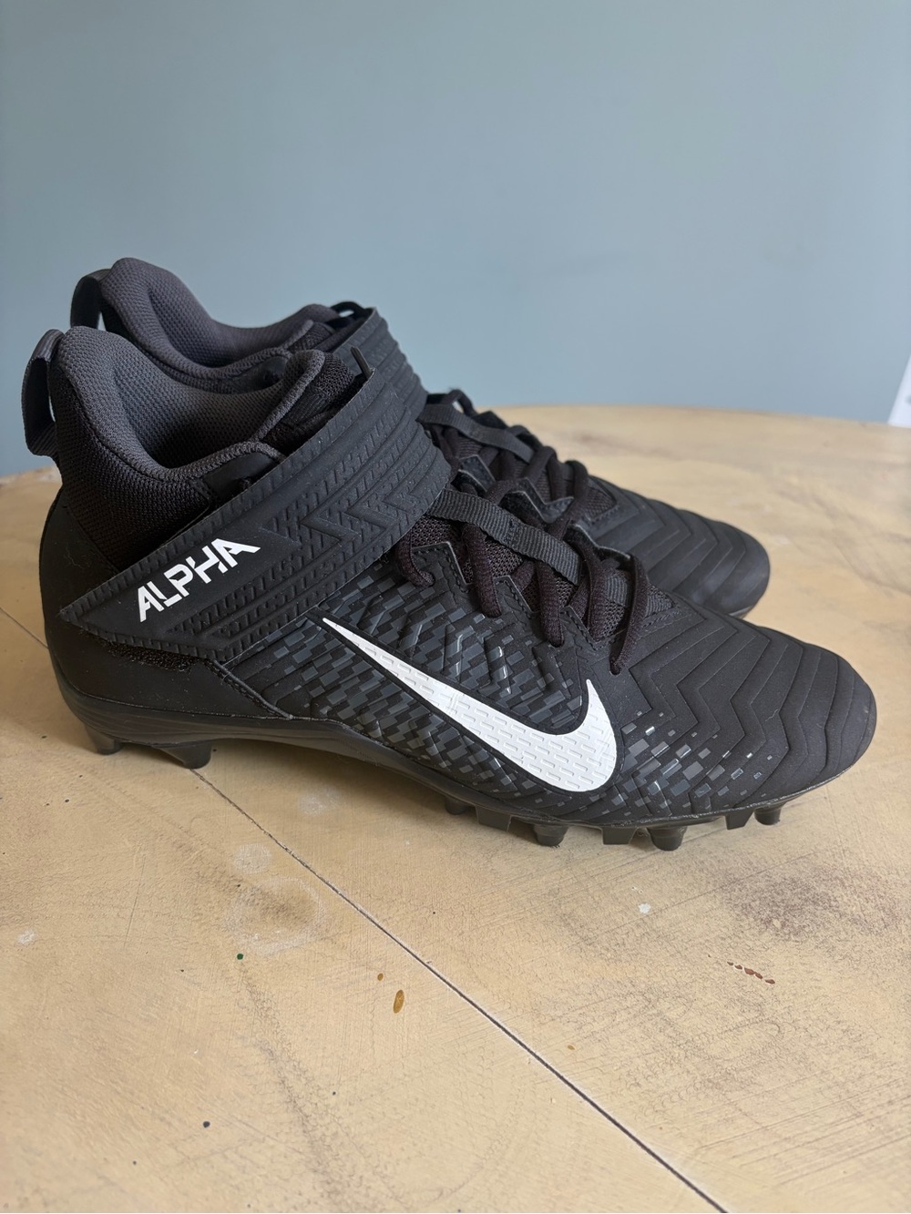 Nike Alpha Men's Black Football Cleats with White Swoosh